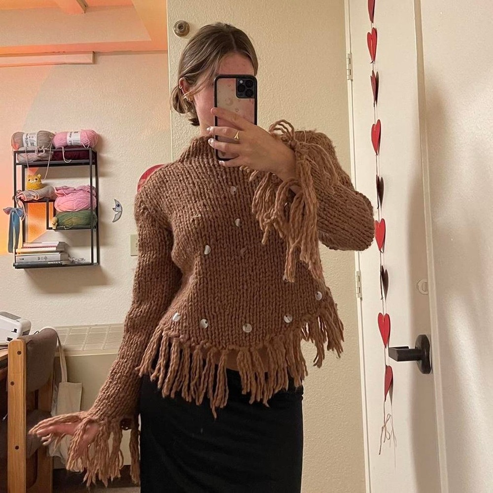 the brown large knit sweater with sequence detailing and flowy sleeves